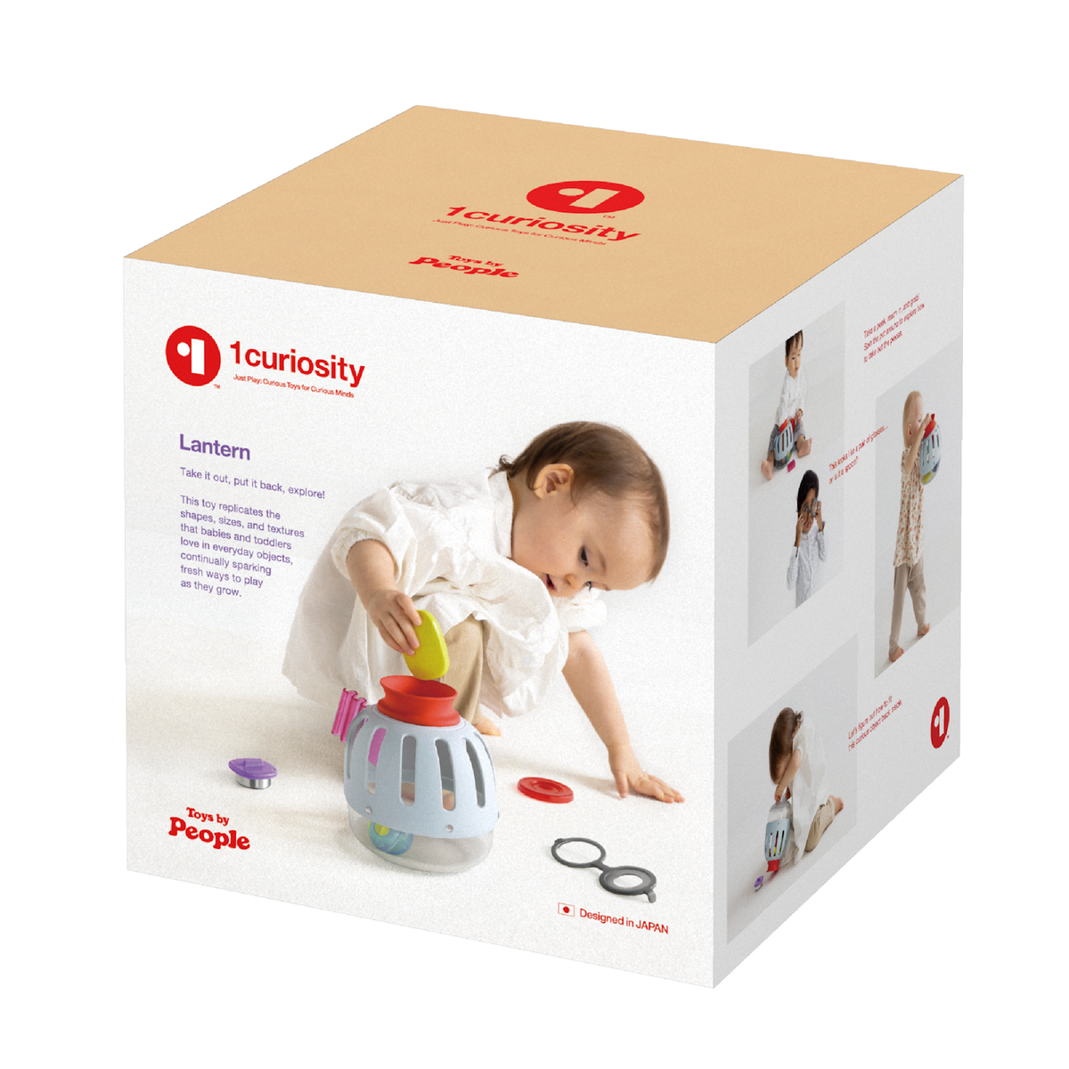 A three-quarter view shows a beige cardboard box for the light blue plastic curiosity lantern toy.