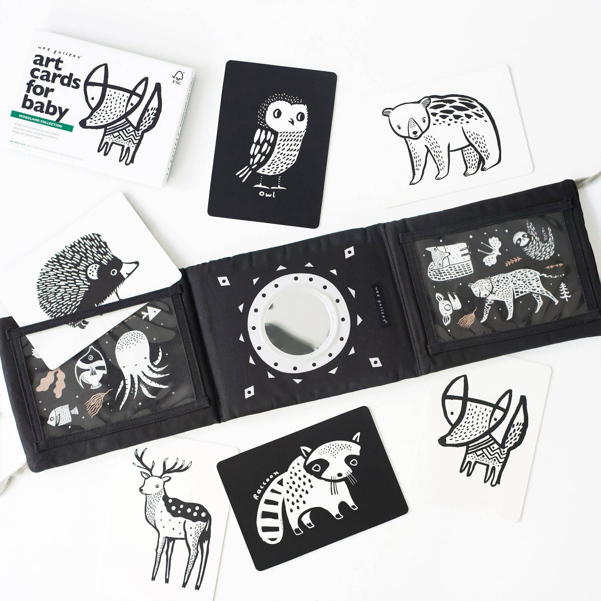 Black and white art cards with animal illustrations on a white background