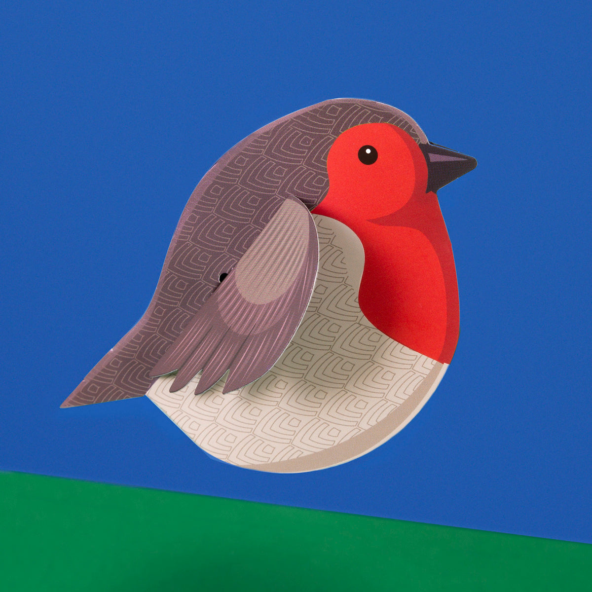 Illustration of a stylized bird with a red head and beige patterned body against a blue background and green surface, conveying a playful tone.