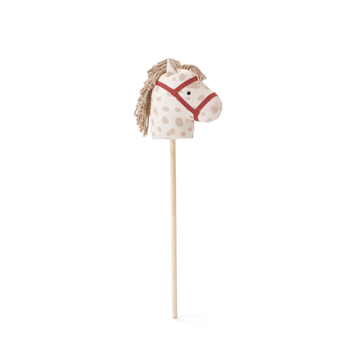 Plush spotted hobby horse toy on a wooden stick with a red bridle, against a white background.