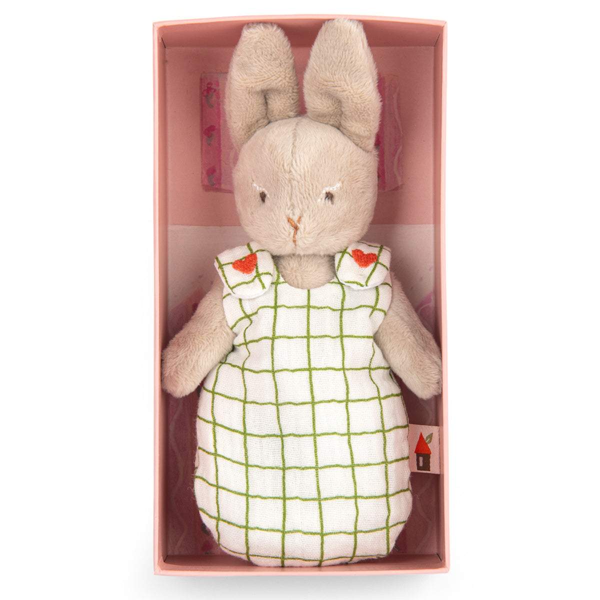 Soft plush bunny with beige fur, wearing a checkered green and white dress decorated with small heart accents. The tone is sweet and comforting.