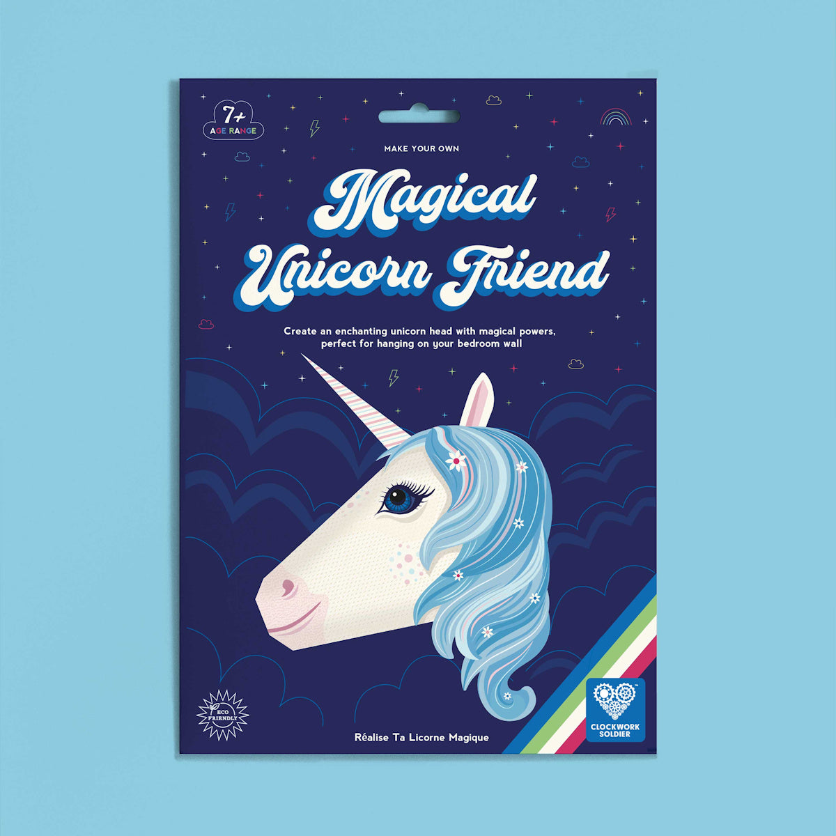 Colorful packaging of a unicorn craft kit titled "Magical Unicorn Friend." Features a white unicorn with blue mane against a dark blue, starry sky.