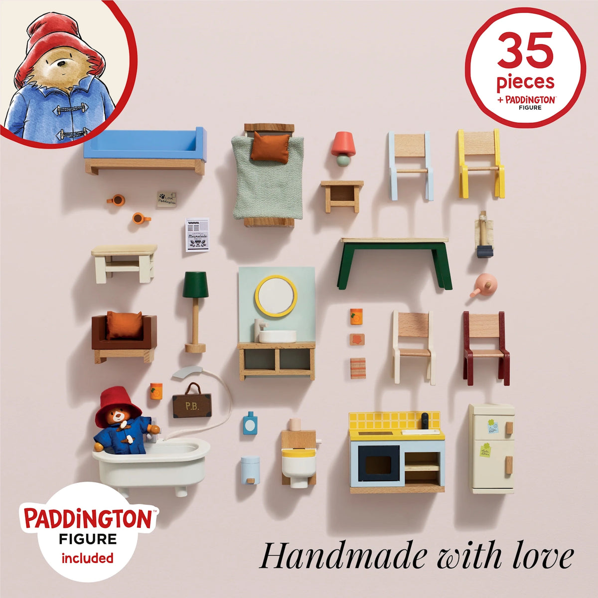 A 35-piece wooden dollhouse furniture set flat lay with a Paddington Bear figure resting in a white bathtub.