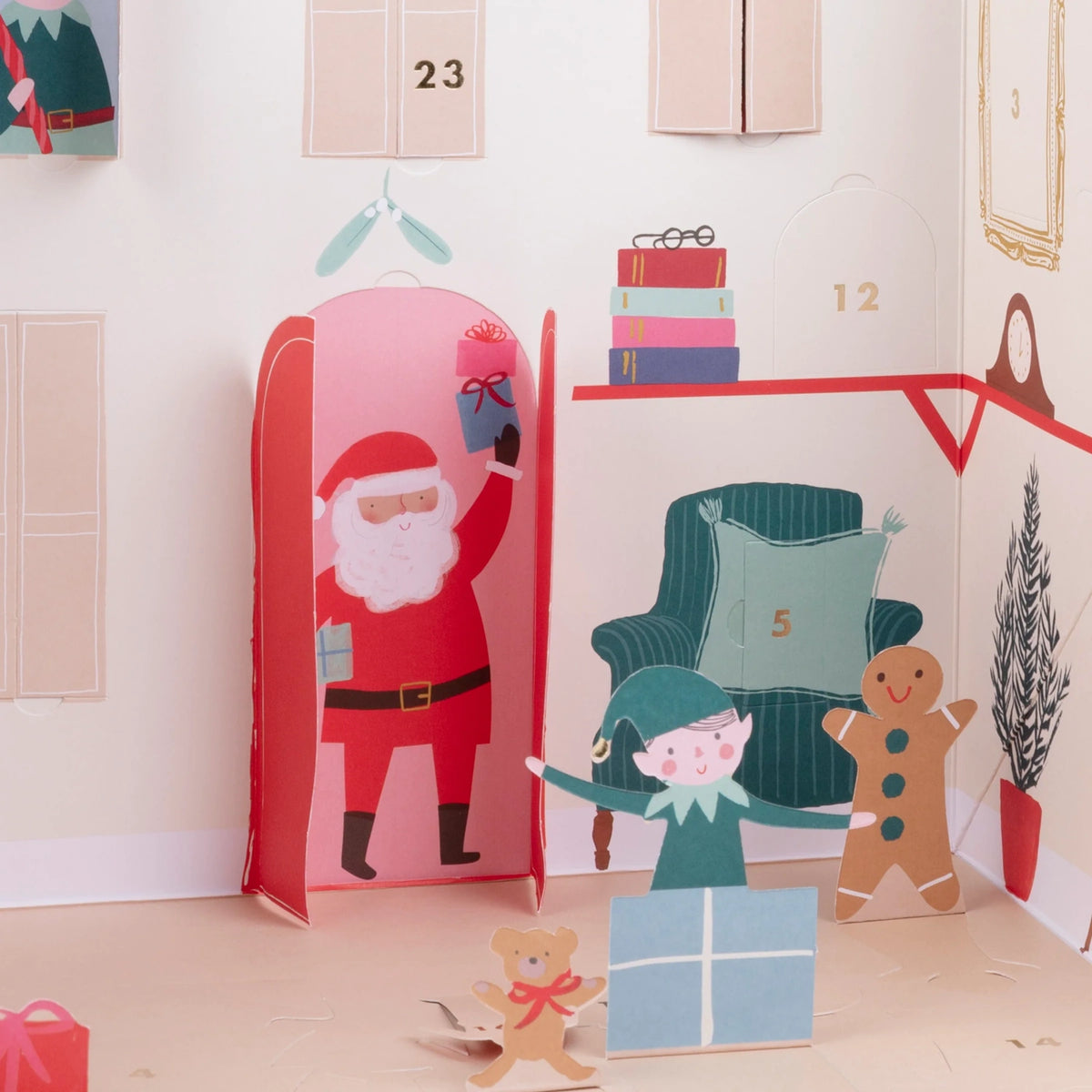 Detailed view of Santa's house pop-up advent calendar featuring numbered doors, Santa, and an elf.