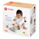 Three-quarter view of the beige and white cardboard packaging box for the 1curiosity Nook toy.