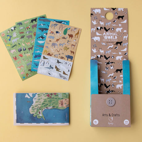 Londji Animal World Poster & Stickers set with packaging, map, and sticker sheets displayed on a yellow background.