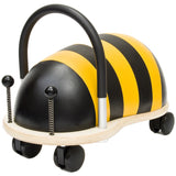 Plush bee ride on toy with wheels and black handle for toddlers.