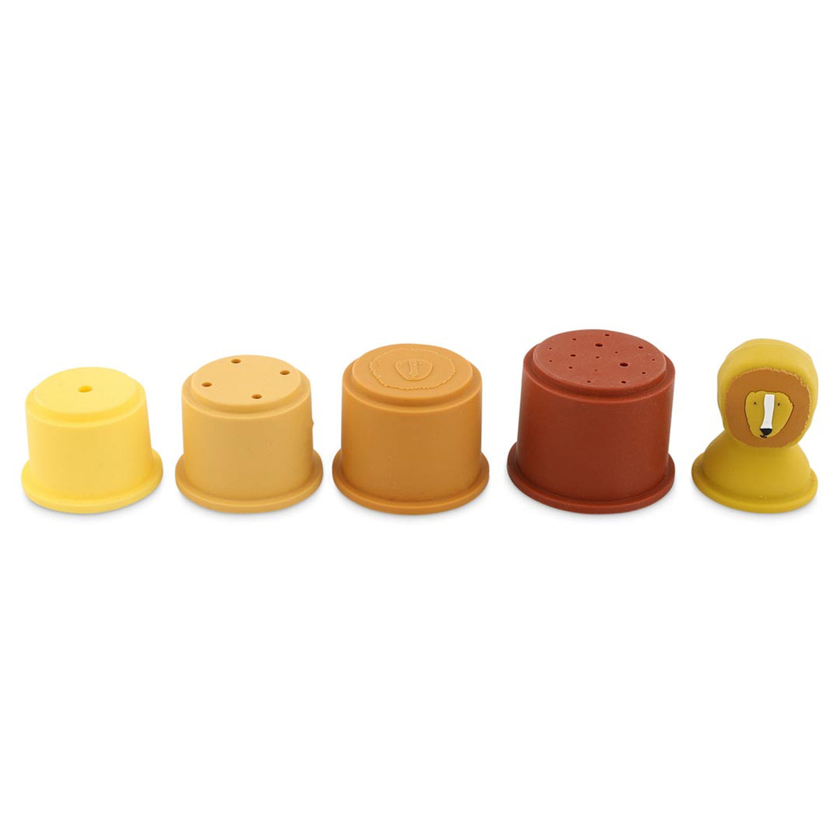 Five plastic spice shakers in shades of yellow and brown, each with different hole patterns, arranged in a row on a white background.
