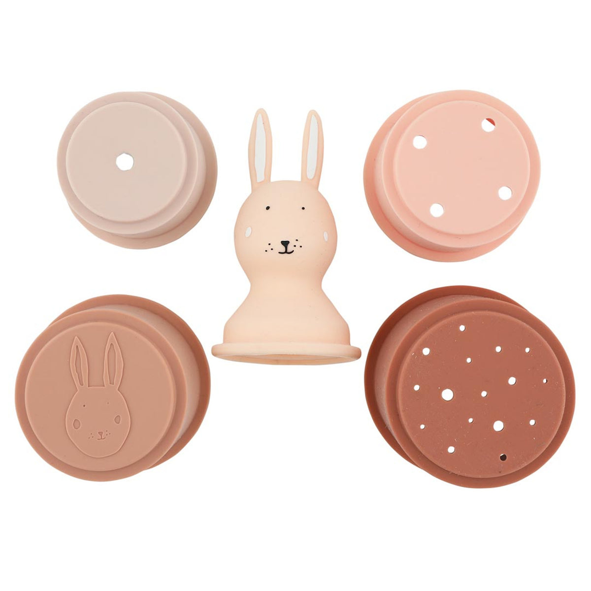 Five silicone rabbit-themed stacking toys in neutral tones. Centered is a rabbit head with ears, surrounded by circular pieces with holes.