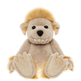 Front view of a sitting beige plush creature toy with fluffy yellow hair, floppy ears, and a toothy smile.