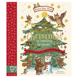 Illustrated book cover showing animals decorating a Christmas tree. Owls, squirrels, and a bear place ornaments. Text reads, "Christmas is coming to town!"