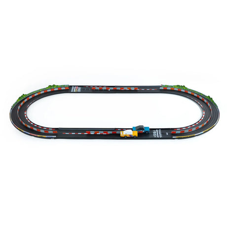 Candylab Roadworks Oval Speedway playset with two wooden toy cars racing on a black track with red and white barriers.