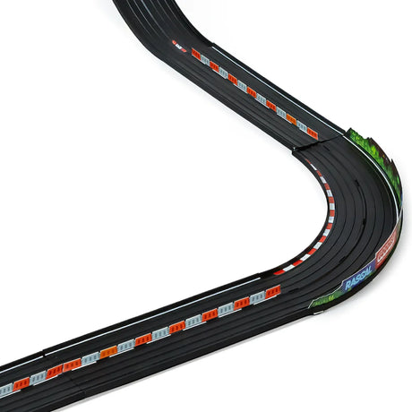 Close-up of Candylab Roadworks straight and curved black toy race track with orange barriers and colorful signage.