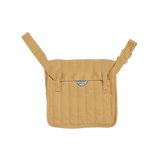 Back view of a honey yellow quilted convertible doll changing bag with adjustable straps.