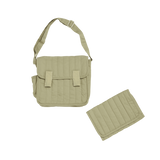 Sage green quilted convertible diaper bag and matching changing mat set.