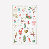 Meri Meri Christmas temporary tattoo sheet packaging with festive holiday designs.