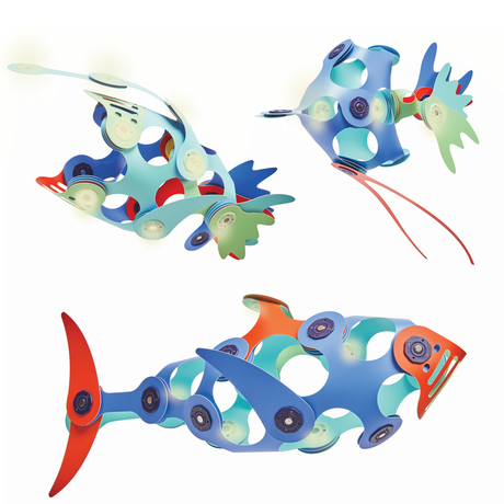 Three colorful ocean creatures built from flexible magnetic toy pieces against a white background.