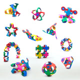 Various colourful 3D shapes and figures built using Clixo magnetic pieces, arranged on a white background.