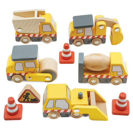 Set of yellow wooden toy construction vehicles, traffic cones, and a road sign.