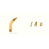 A beige crayon with a slumped posture and sad expression standing over a blue puddle next to the word "SAD" in gold text.