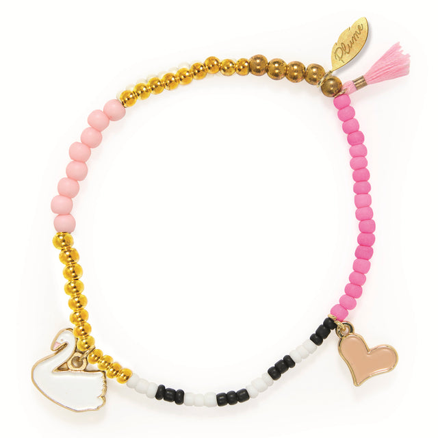 Dance collection girls beaded bracelet with gold swan and heart charms, pink tassel accent.