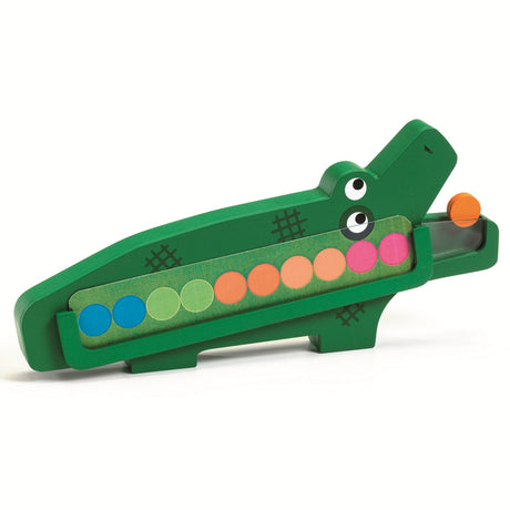 Green wooden crocodile counting toy for kids with colorful sliding discs on a white background.