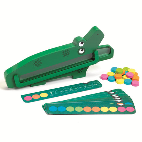 Wooden green crocodile logic game with colorful pattern sequence cards and circular tokens for kids.