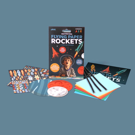 Flying Paper Rockets craft kit packaging with stickers, launch straws, and colorful origami paper.
