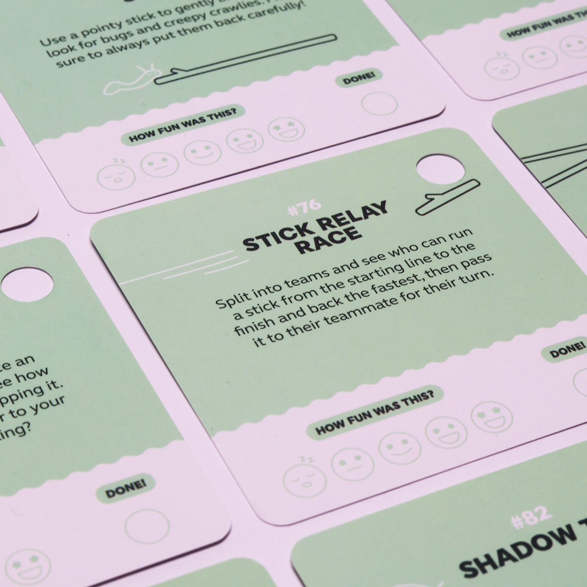 Green activity cards showing creative ideas and challenges for kids using sticks.