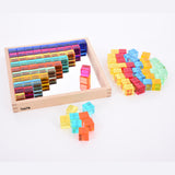 A square wooden tray with a mirrored base and colorful gem-like insets, designed to inspire sensory exploration, pattern making, and visual play.