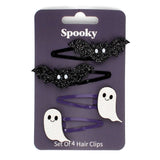 Set of four Halloween hair clips featuring two black glitter bats and two white glitter ghosts on a card.