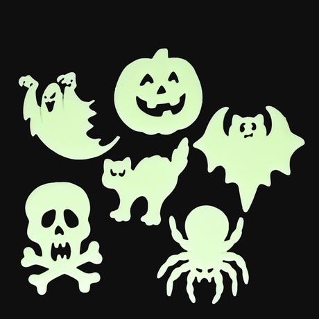Glow-in-the-dark Halloween stick-on shapes including a ghost, pumpkin, bat, cat, skull, and spider.