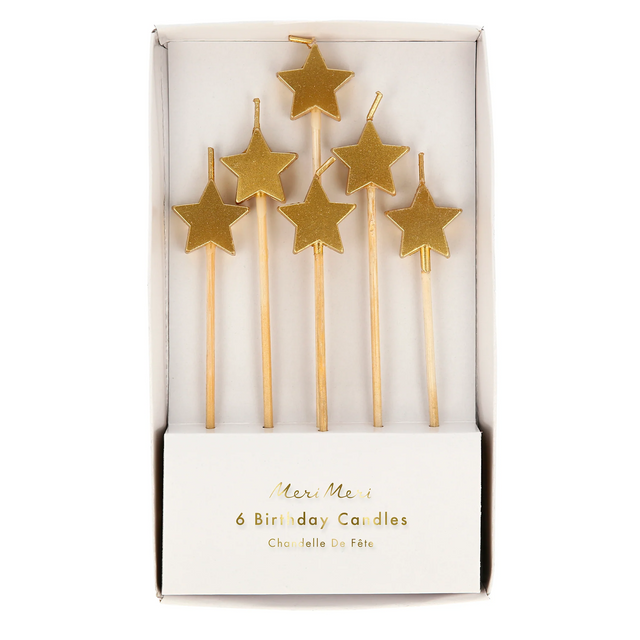 A set of shimmering gold star-shaped candles on sticks, perfect for adding a touch of sparkle to cakes and celebrations.