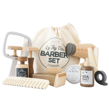 Wooden toy barber set with accessories, hairdryer, mirror, and drawstring storage bag.
