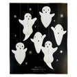 Meri Meri hanging ghost decorations packaging set containing 6 white paper honeycomb ghosts against a star-patterned black backdrop.