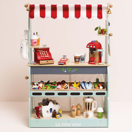 Front view of a wooden market stall play set with a red striped awning, register, and play food.