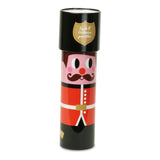 Red and black metal guardsman kaleidoscope toy shown standing in a front view.