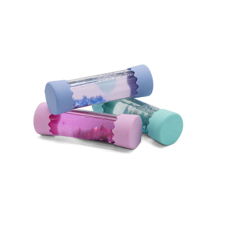 A set of three Jellystone Baby Calm Down Bottles in pastel blue, pink, and teal, each filled with swirling glitter and sensory elements.