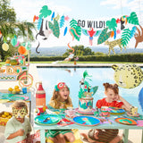 Children at a jungle-themed poolside party with animal masks, a decorated cake, and "Go Wild!" banners.
