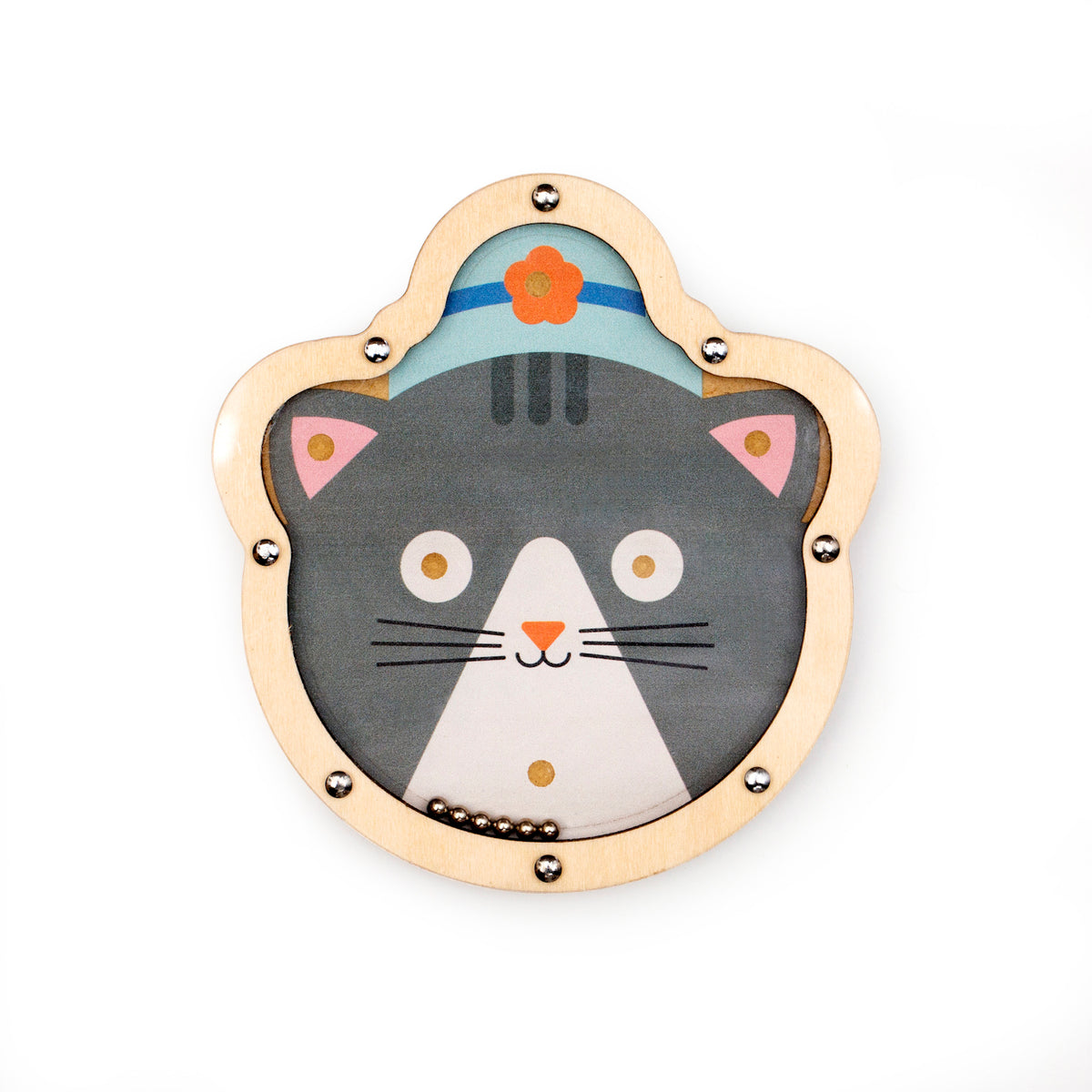 Wooden cat-shaped toy with a gray cat face wearing a blue hat with an orange flower. Its playful expression is framed by a light wood border.