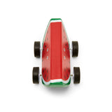 A wooden toy car shaped like a smiling watermelon slice with four wheels. It features a red and green design with painted black seeds, creating a playful and cheerful vibe.