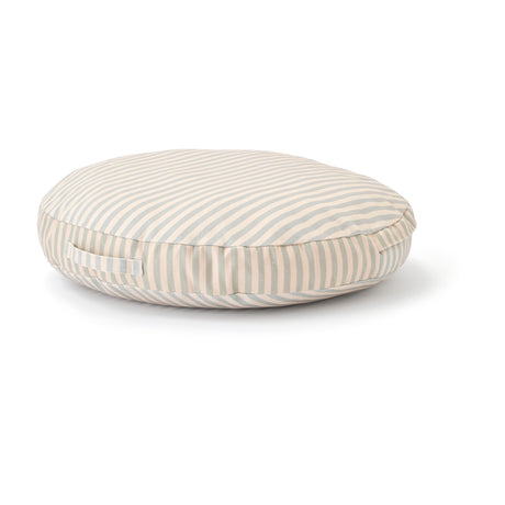 Round, beige and grey striped floor cushion with a side carrying handle, set against a plain white background.