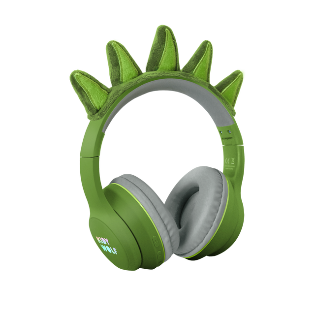 Green headphones with soft, gray ear cushions on a white background, featuring playful green dinosaur spikes on the headband, conveying a fun and quirky vibe.