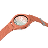 A coral-colored smartwatch with a woven strap showing the time and fitness metrics on a white background.