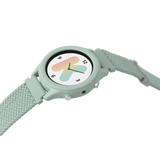 A light green smartwatch with a woven strap and a colorful letter K on the watch face.