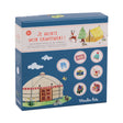 Box cover for a children's observation game titled "Je monte mon campement!" showing a yurt, animals, camping icons, and playfully illustrated items.