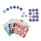 A selection of colorful game cards and circular tokens featuring various illustrated objects, such as the moon phases, cameras, and bicycles, laid out on a white background.