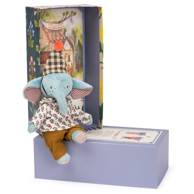 Les Minouchkas Pablo the Elephant plush doll sitting on its decorative illustrated gift box.