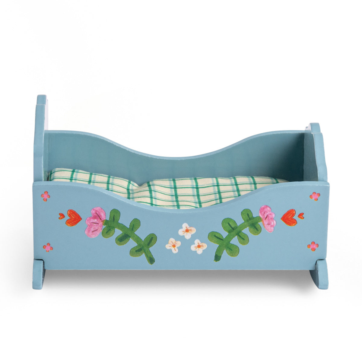 Blue wooden toy doll cradle with floral painted details and a green plaid mattress on a white background.