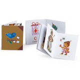 Les Minouchkas fireside accessories miniature storybooks with cute animal illustrations.